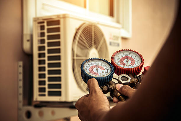 Professional Air Conditioning Service technician working in Homestead, FL